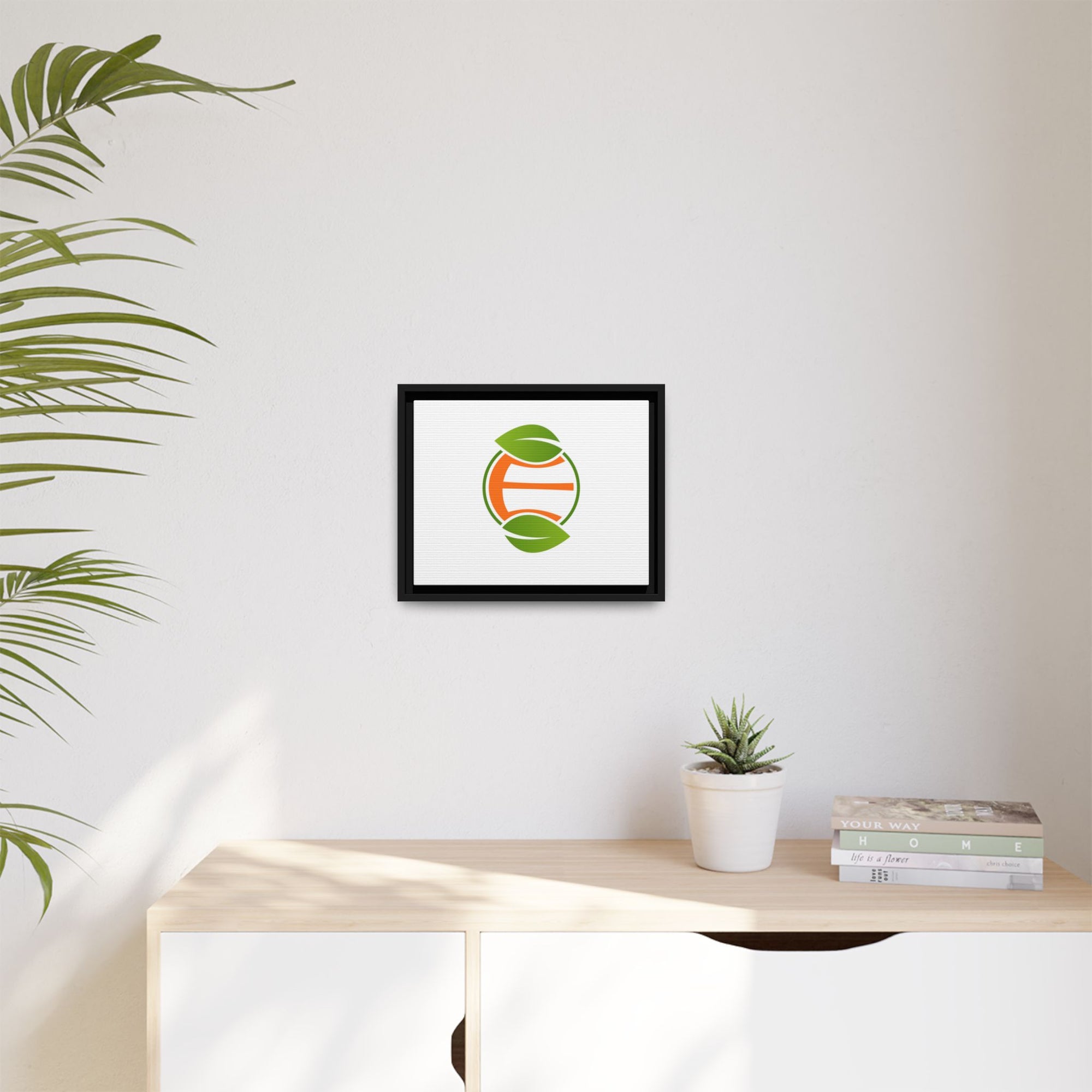Framed Matte Canvas Print — Minimal Green Orange Leaf Logo Wall Art
