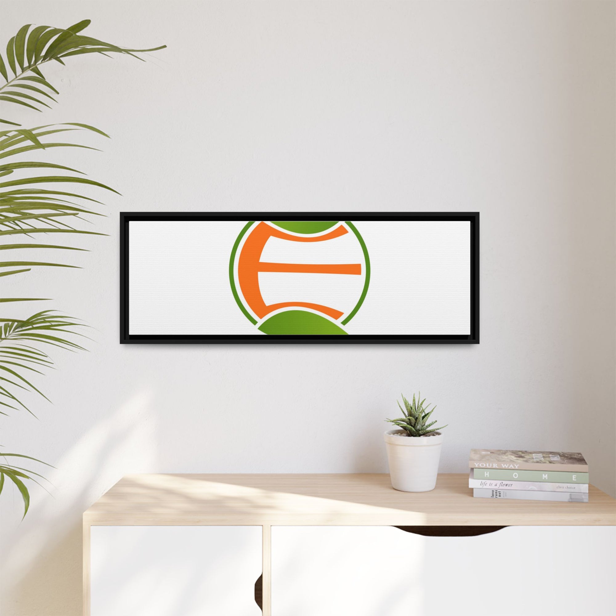 Framed Matte Canvas Print — Minimal Green Orange Leaf Logo Wall Art